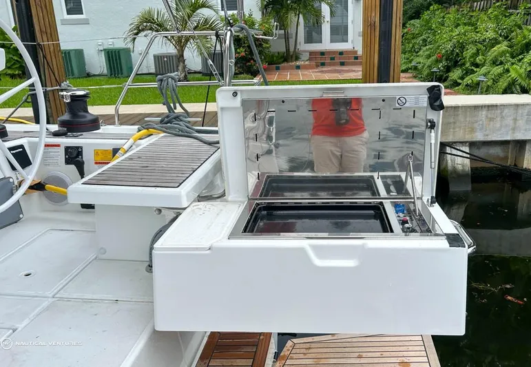  Yacht Photos Pics 2024 Beneteau Oceanis 51.1 yacht with outdoor grill station.