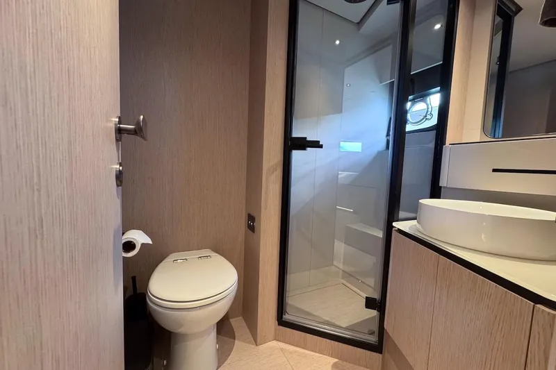 Macu Yacht Photos Pics Luxurious bathroom in 2024 Ferretti Yachts 580, featuring modern fixtures and elegant design.