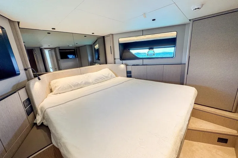 Macu Yacht Photos Pics Luxurious bedroom interior of 2024 Ferretti Yachts 580 with modern design and large bed.