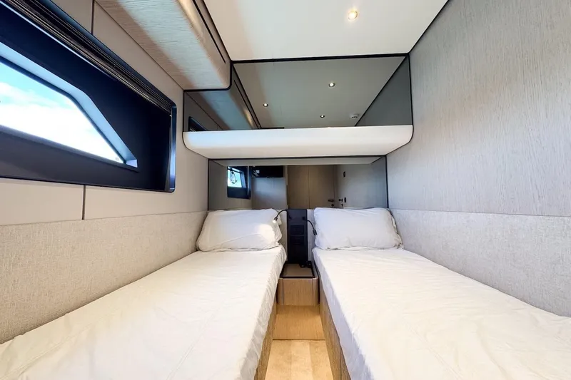 Macu Yacht Photos Pics Luxurious twin cabin interior of 2024 Ferretti Yachts 580, featuring modern design and comfort.