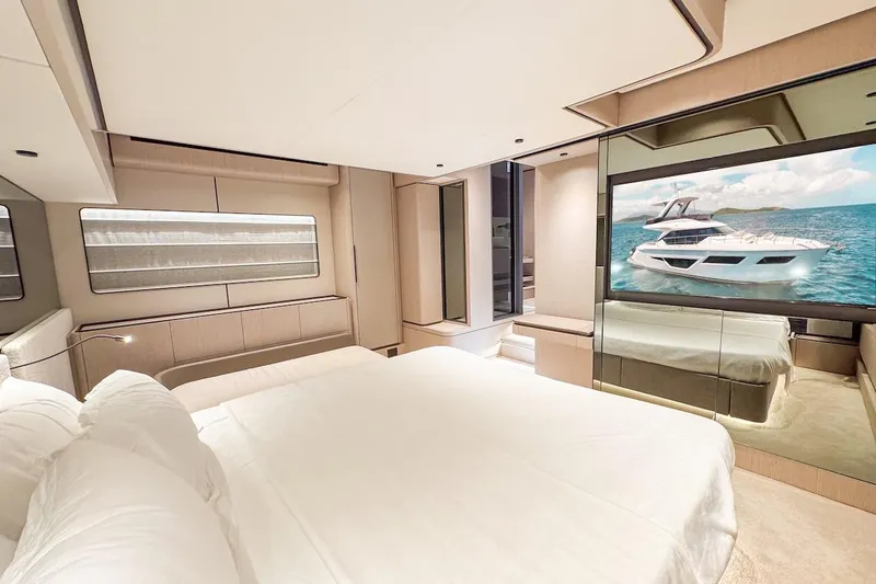 Macu Yacht Photos Pics Luxurious bedroom interior of 2024 Ferretti Yachts 580 with modern design and ocean view.