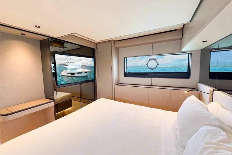 Macu Yacht Photos Pics Luxurious bedroom interior of 2024 Ferretti Yachts 580, featuring modern design and ocean view.