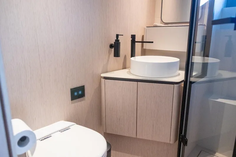 Macu Yacht Photos Pics Modern bathroom in 2024 Ferretti Yachts 580, featuring sleek fixtures and minimalist design.