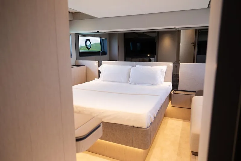 Macu Yacht Photos Pics Luxurious bedroom interior of 2024 Ferretti Yachts 580, featuring modern design and elegant furnishings.