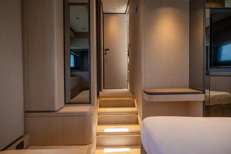 Macu Yacht Photos Pics Luxurious interior of 2024 Ferretti Yachts 580, featuring elegant wood finishes and ambient lighting.