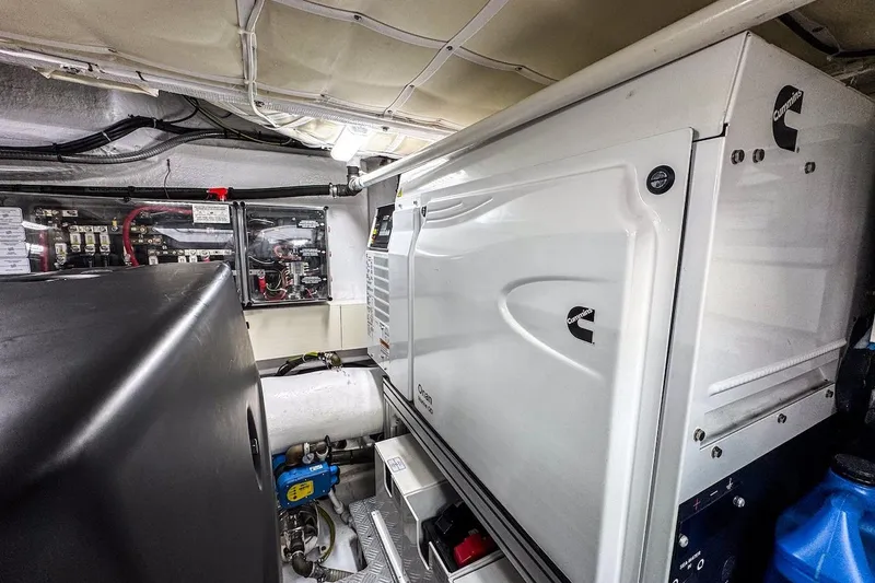 Macu Yacht Photos Pics Engine room of 2024 Ferretti Yachts 580, featuring Cummins generator and electrical systems.