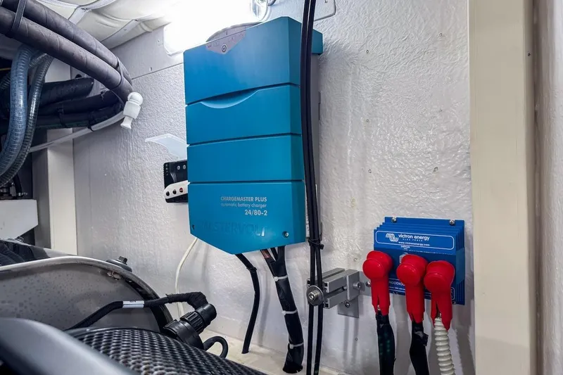 Macu Yacht Photos Pics Engine room of 2024 Ferretti Yachts 580 with battery charger and wiring.