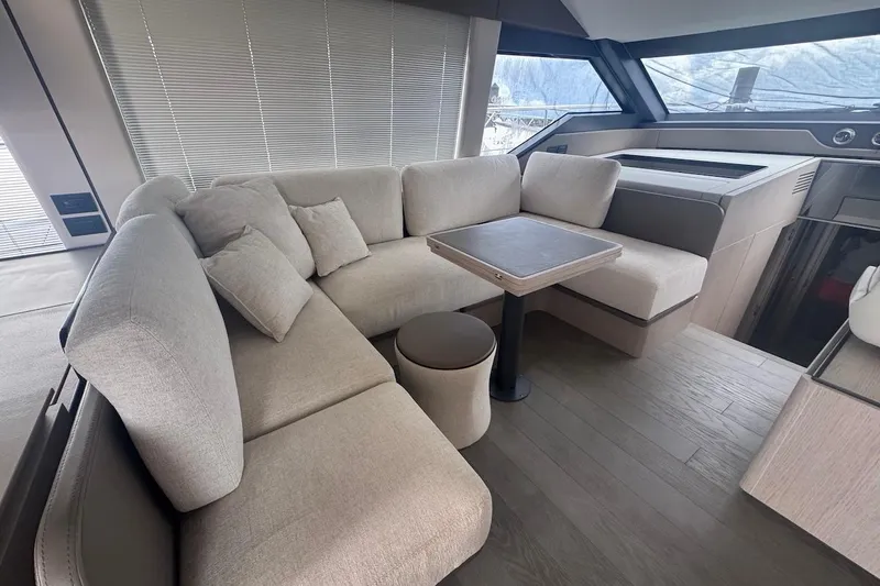 Macu Yacht Photos Pics Luxurious interior of 2024 Ferretti Yachts 580 with elegant seating and modern design.
