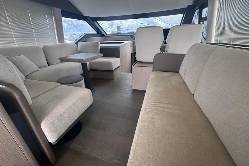 Macu Yacht Photos Pics Luxurious interior of 2024 Ferretti Yachts 580 with elegant seating and modern design.