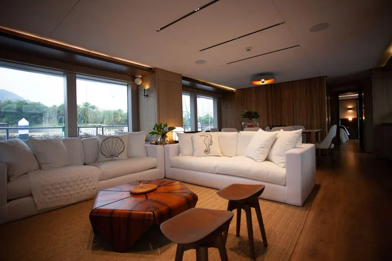  Yacht Photos Pics Luxurious interior of 2027 Inace Explora 90 yacht with elegant seating and modern decor.