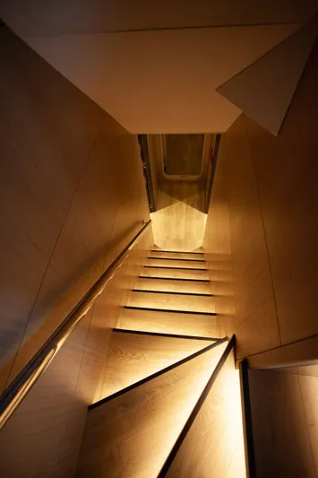  Yacht Photos Pics Wooden staircase with ambient lighting inside Inace Explora 90 yacht, 2027 model.