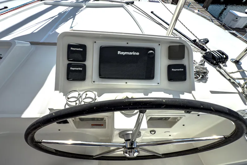  Yacht Photos Pics Steering wheel and Raymarine navigation system on 2012 Lagoon 450 F yacht.