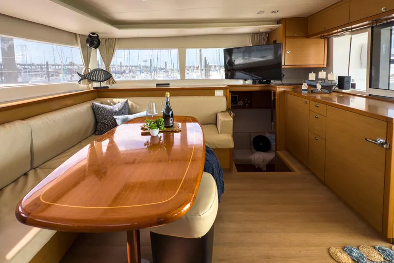  Yacht Photos Pics Luxurious interior of 2012 Lagoon 450 F yacht with elegant dining area and modern amenities.