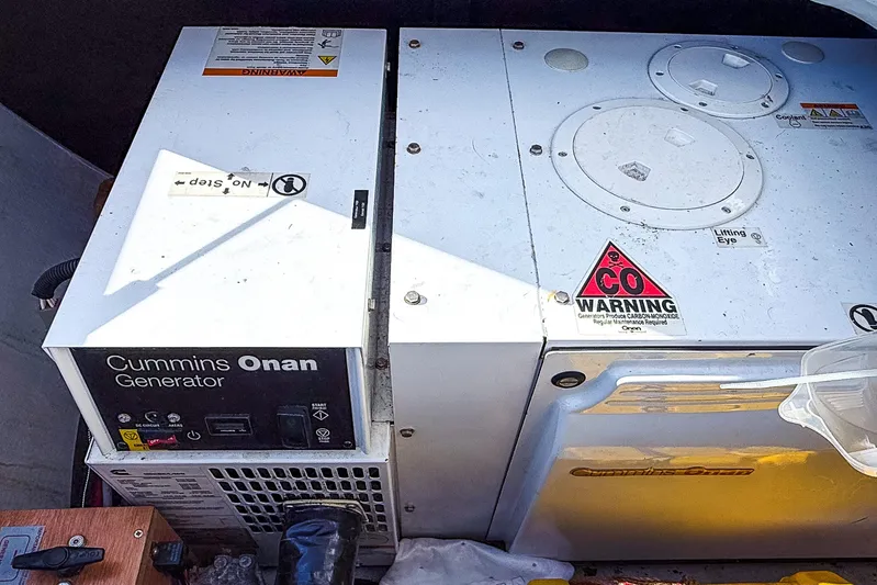  Yacht Photos Pics Cummins Onan generator in a 2012 Lagoon 450 F yacht engine compartment.