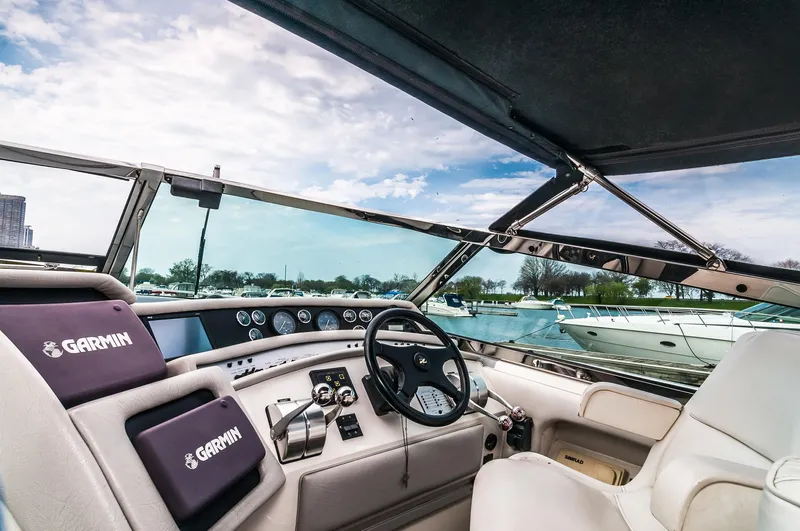  Yacht Photos Pics Cockpit view of a 1994 Sea Ray 500 Sundancer yacht with Garmin navigation equipment.