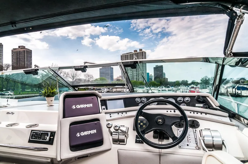  Yacht Photos Pics Cockpit view of a 1994 Sea Ray 500 Sundancer yacht with Garmin navigation.