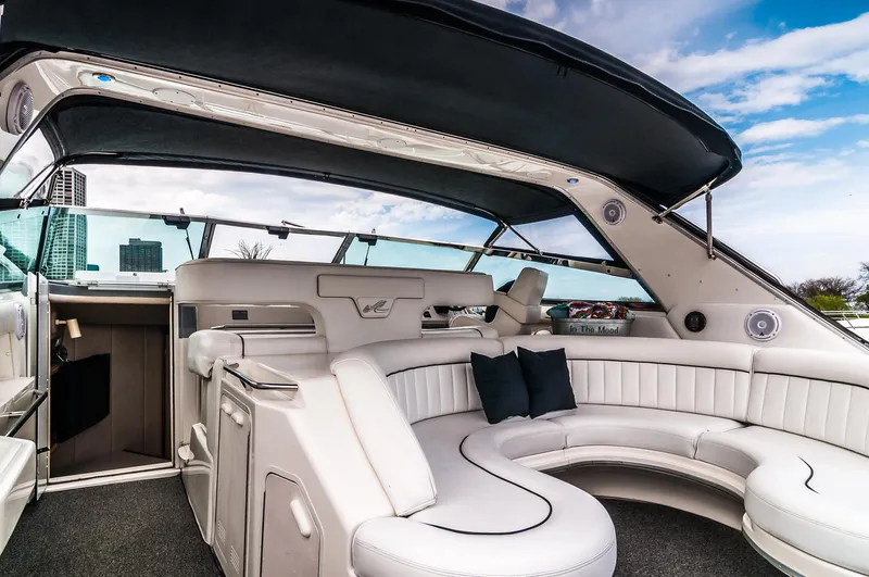  Yacht Photos Pics Interior of 1994 Sea Ray 500 Sundancer yacht with white leather seating.