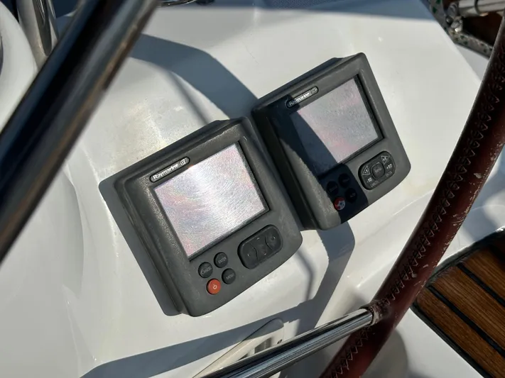 Shamrock Yacht Photos Pics Two navigation instruments on a 2011 Beneteau Oceanis 40 yacht dashboard.