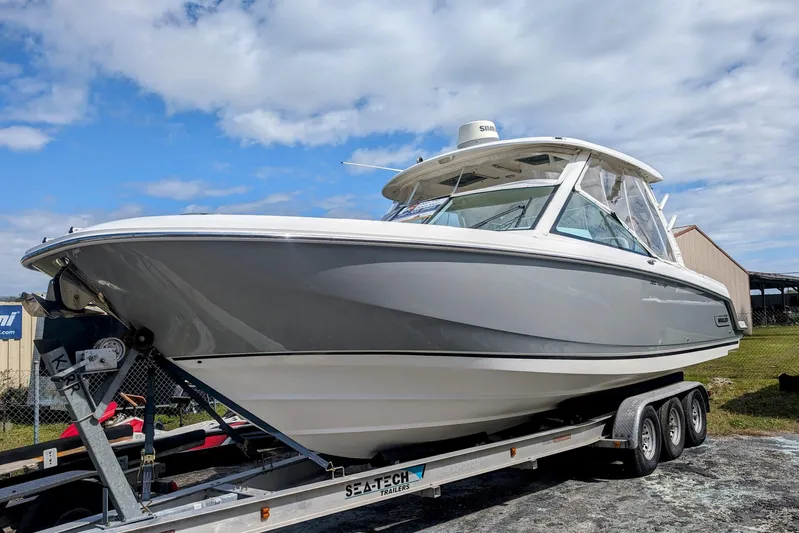 Boston Whaler 320 Vantage Twin 350 Merc Joystick Yacht Photos Pics 2017 BW Port Side on Trailer.jpg