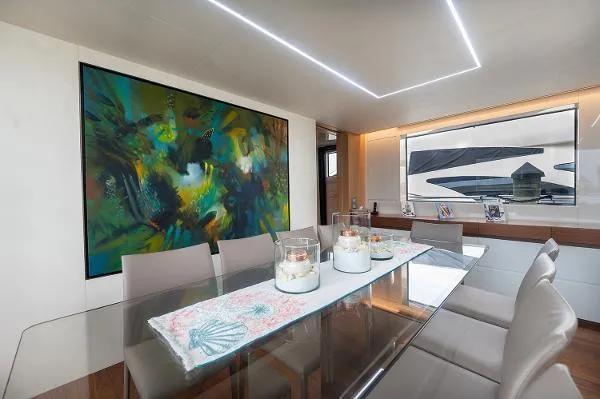 Ryen - Sl106/637 Yacht Photos Pics Luxurious dining area on 2017 Sanlorenzo SL106 yacht with modern art and elegant decor.