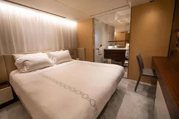 Ryen - Sl106/637 Yacht Photos Pics Luxurious bedroom interior on 2017 Sanlorenzo SL106 yacht, featuring elegant design and modern amenities.