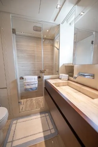 Ryen - Sl106/637 Yacht Photos Pics Luxurious bathroom on 2017 Sanlorenzo SL106 yacht with modern shower and sleek vanity.