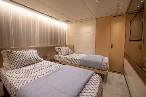Ryen - Sl106/637 Yacht Photos Pics Luxurious twin bedroom on 2017 Sanlorenzo SL106 yacht with modern decor and soft lighting.