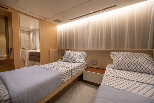 Ryen - Sl106/637 Yacht Photos Pics Luxurious twin bedroom on 2017 Sanlorenzo SL106 yacht with modern decor and ensuite bathroom.