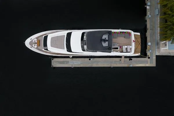 Ryen - Sl106/637 Yacht Photos Pics Overhead view of a 2017 Sanlorenzo SL106 yacht docked at a marina.
