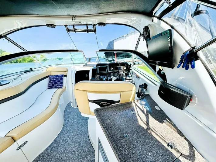  Yacht Photos Pics Interior of 2012 Rinker 310 Fiesta Vee boat with modern dashboard and seating.