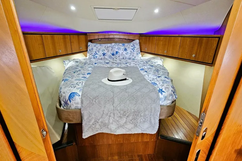  Yacht Photos Pics Luxurious cabin interior of 2007 Tiara 3900 Sovran yacht with cozy bedding.