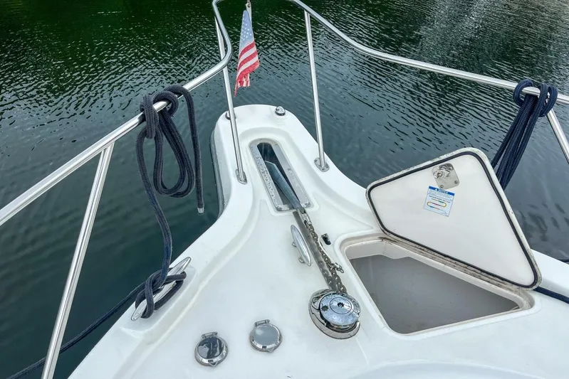  Yacht Photos Pics Bow of 2007 Tiara 3900 Sovran yacht with anchor and American flag.