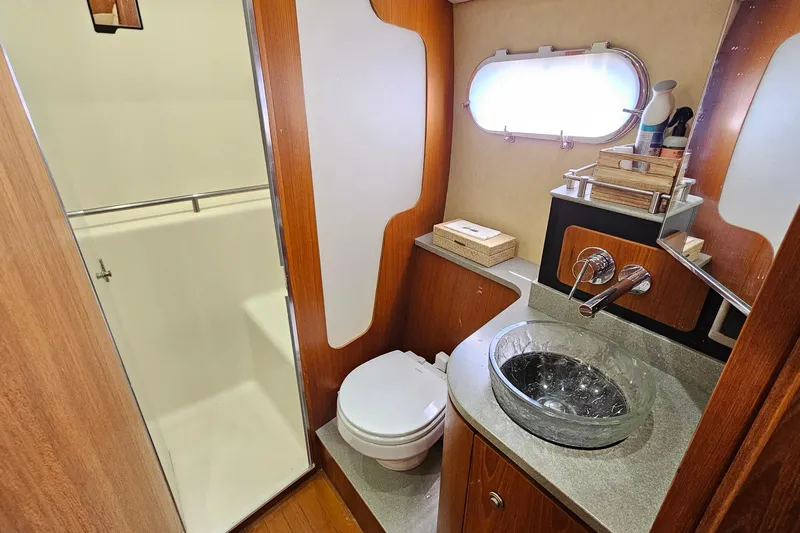  Yacht Photos Pics Luxurious 2007 Tiara Yachts 3900 Sovran bathroom with modern fixtures and elegant design.