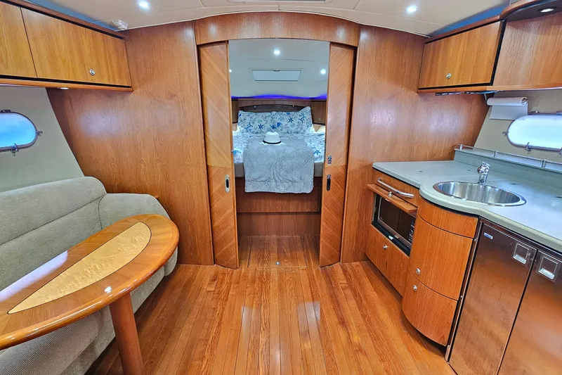 Yacht Photos Pics Luxurious 2007 Tiara Yachts 3900 Sovran interior with wood finish and modern amenities.