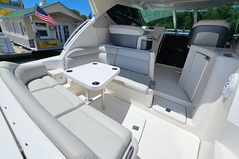  Yacht Photos Pics Luxurious interior of 2007 Tiara Yachts 3900 Sovran with elegant seating and table.