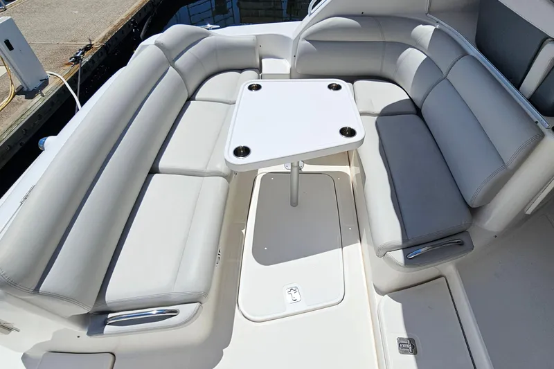  Yacht Photos Pics 2007 Tiara Yachts 3900 Sovran cockpit with cushioned seating and table.