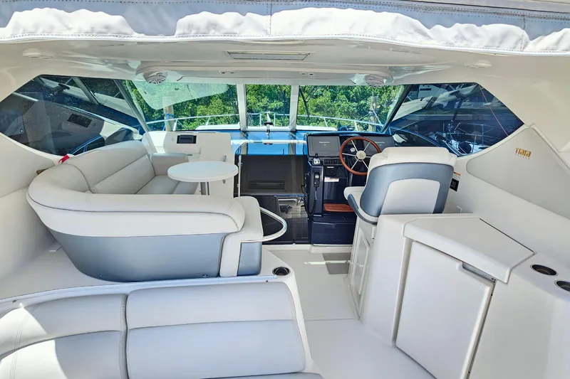  Yacht Photos Pics Luxurious interior of 2007 Tiara Yachts 3900 Sovran with plush seating and modern helm.