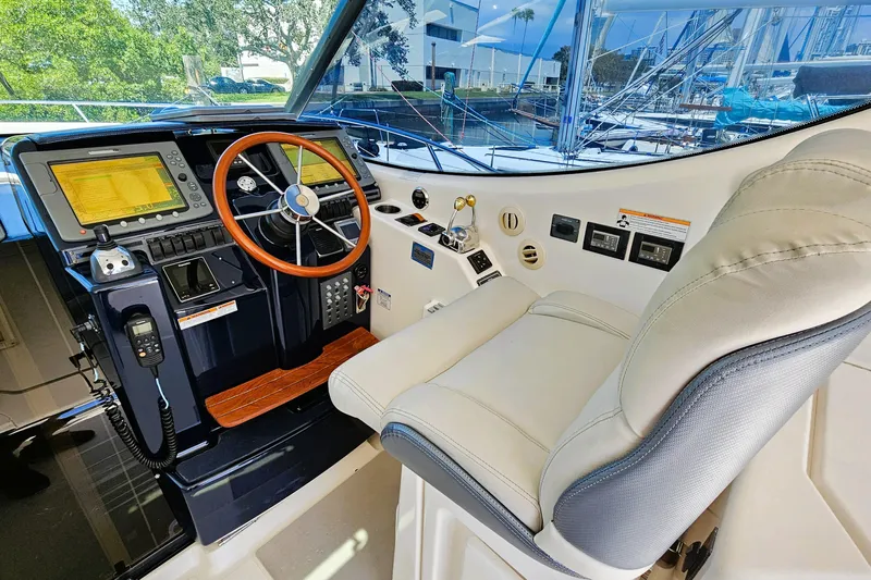  Yacht Photos Pics 2007 Tiara Yachts 3900 Sovran helm with leather seat and advanced navigation controls.