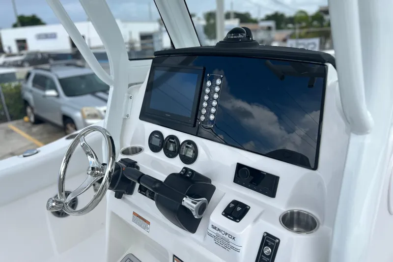  Yacht Photos Pics Dashboard of 2026 Sea Fox 268 Commander boat with steering wheel and controls.