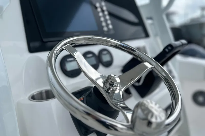  Yacht Photos Pics Steering wheel of 2026 Sea Fox 268 Commander boat with control panel.