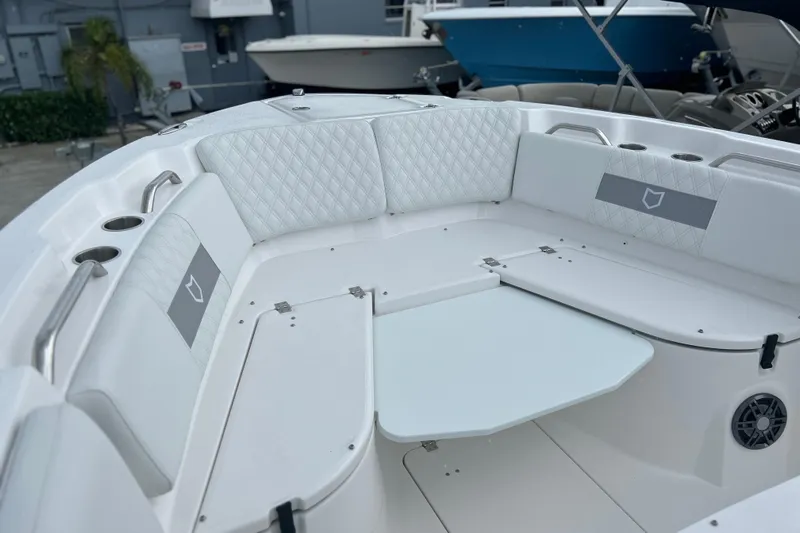  Yacht Photos Pics 2026 Sea Fox 268 Commander boat interior with white seating and table.
