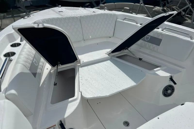  Yacht Photos Pics 2026 Sea Fox 268 Commander boat interior with open storage compartments and seating.