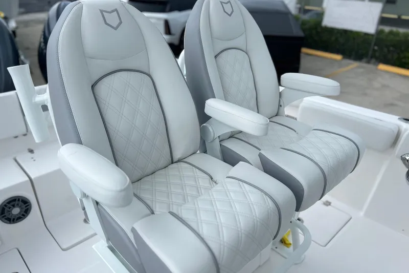  Yacht Photos Pics Luxury seating on 2026 Sea Fox 268 Commander boat, featuring diamond-stitched upholstery.