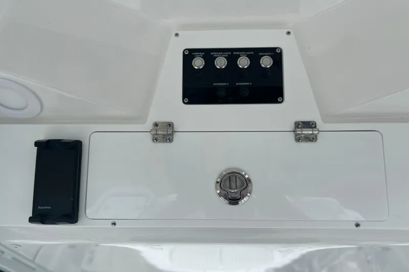  Yacht Photos Pics Control panel of 2026 Sea Fox 268 Commander boat with switches and storage compartment.