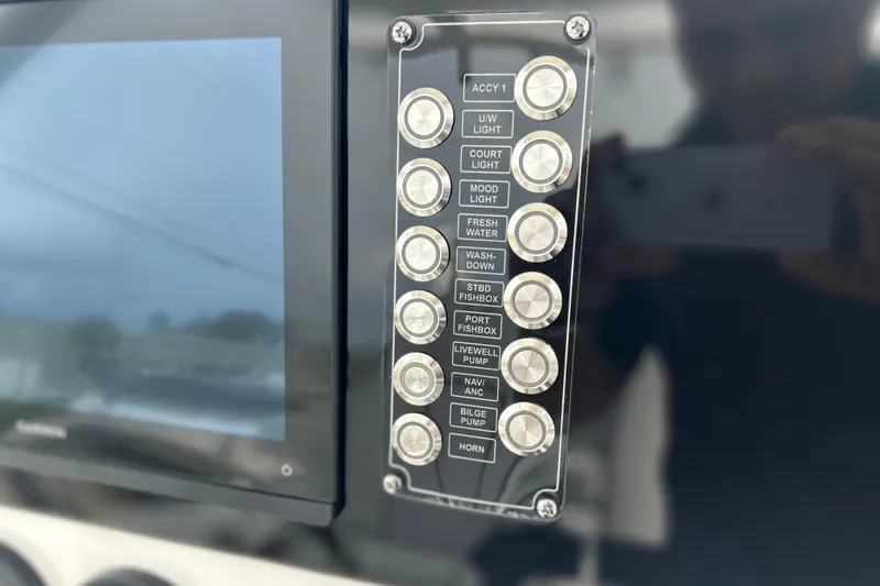 Yacht Photos Pics Control panel of 2026 Sea Fox 268 Commander boat with labeled buttons and display screen.