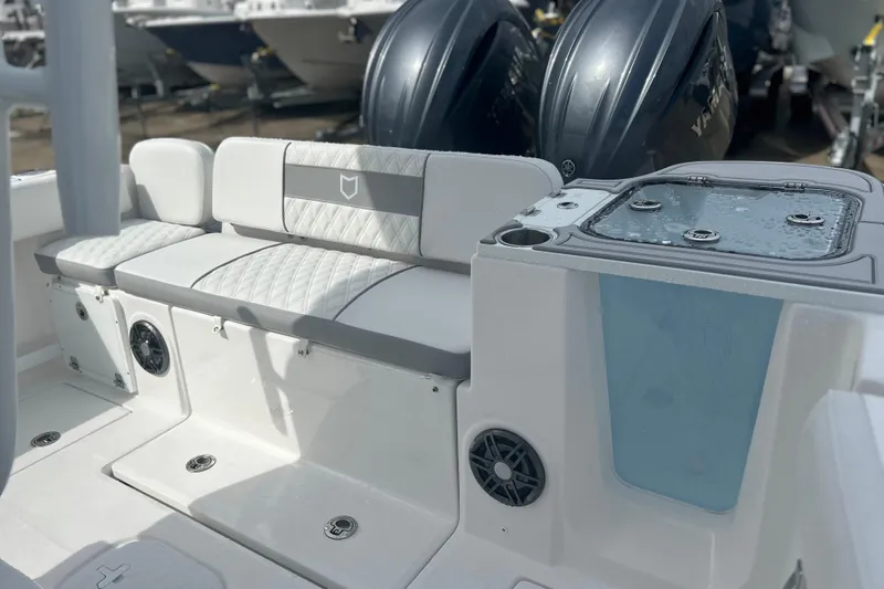  Yacht Photos Pics 2026 Sea Fox 268 Commander boat interior with cushioned seating and dual engines.