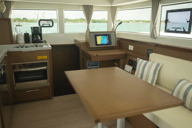 Wanderlust Yacht Photos Pics Interior of 2020 Lagoon 40 catamaran with modern kitchen and navigation equipment.