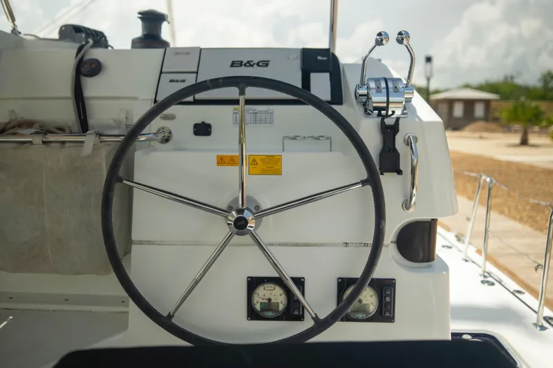 Wanderlust Yacht Photos Pics Steering wheel of a 2020 Lagoon 40 catamaran with B&G navigation system.