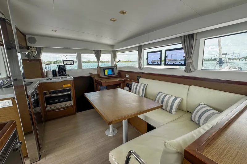 Wanderlust Yacht Photos Pics Interior of 2020 Lagoon 40 catamaran with modern kitchen and cozy seating area.
