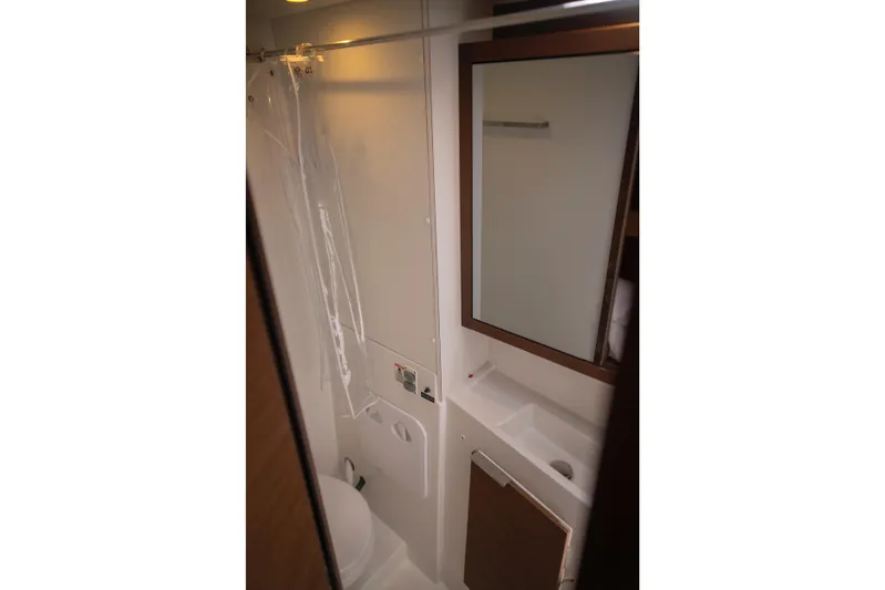 Wanderlust Yacht Photos Pics Bathroom interior of 2020 Lagoon 40 catamaran with mirror and shower.